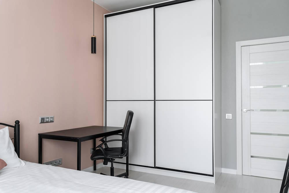 interior-minimalist-style-wardrobe-table-chair-chest-drawers-floor-mirror-bedroom-design